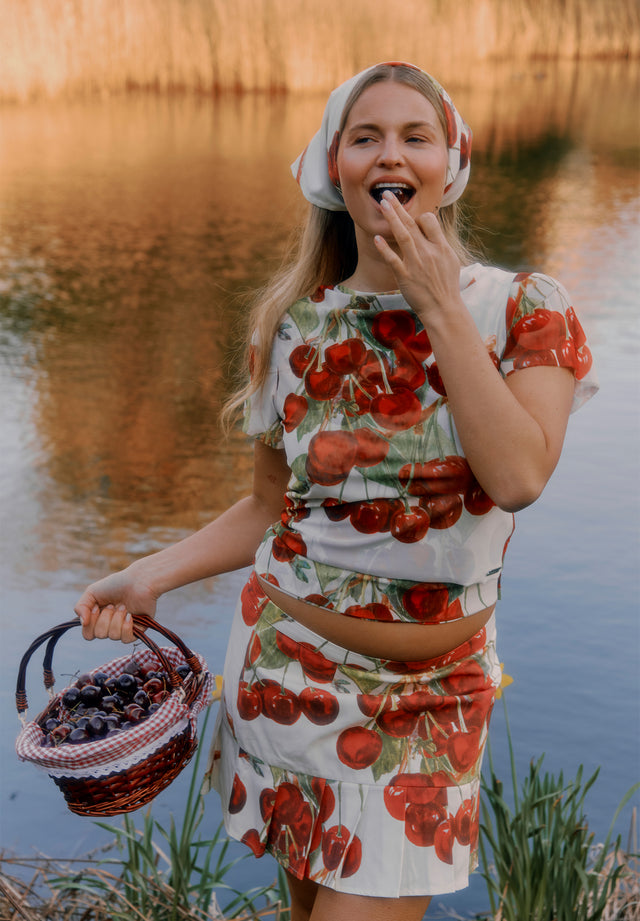THE CHERRY PLEAT SKIRT